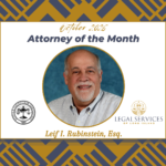 October 2026 Attorney of the Month graphic featuring Leif I. Rubinstein, Esq. His portrait is centered within a gold circle. The Suffolk County Bar Association logo appears on the left and the Legal Services of Long Island logo appears on the right.