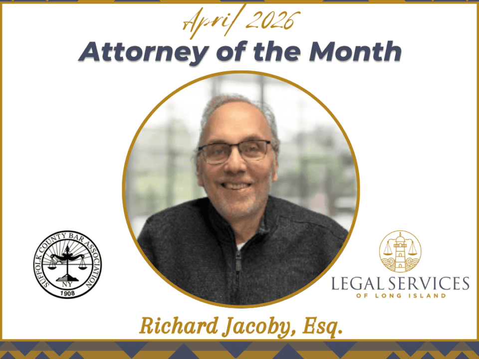 April 2026 Attorney of the Month graphic featuring Richard Jacoby, Esq. His portrait is centered within a gold circle. The Suffolk County Bar Association logo appears on the left and the Legal Services of Long Island logo appears on the right.