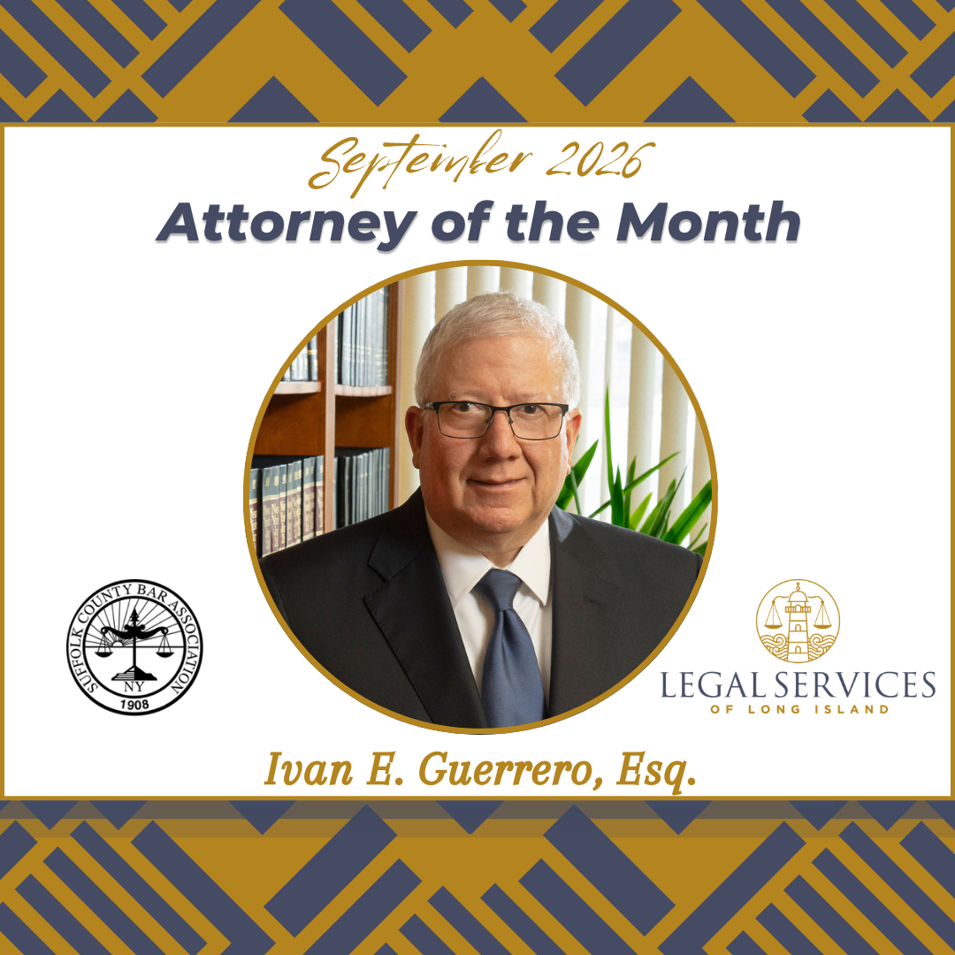 September 2026 Attorney of the Month graphic featuring Ivan E. Guerrero, Esq. His portrait is centered within a gold circle. The Suffolk County Bar Association logo appears on the left and the Legal Services of Long Island logo appears on the right.